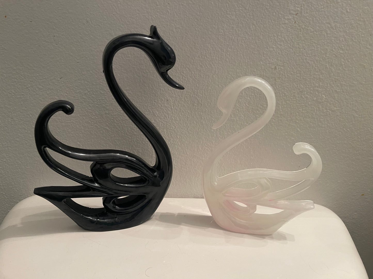 Delicate swan statues